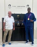 Erik Kynard receives high jump gold medal from 2012 Olympics